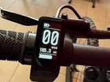a close up of a bike with a gps device on it ' s handlebar