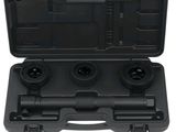 a black tool case with four tools inside of it