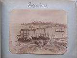 an old photo of a harbor with ships in the water