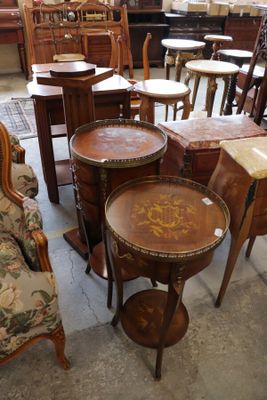 many tables and chairs in a room with a lot of furniture