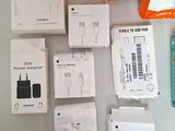 a lot of electronic devices that are sitting on a table