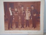an old photo of a group of men in uniform