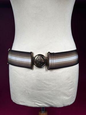 brown and white striped belt on mannequin torso with metal buckle