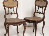pair of antique chairs with cane back and cane seat