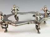 three figurines that are sitting on a table