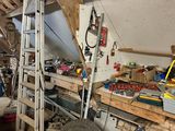 an image of a garage with a lot of tools in it
