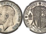 a close up of a coin with a cross on it