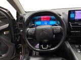 the interior of a car with a steering wheel, dashboard, and dash board