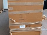 a large cardboard box sitting on top of a pallet