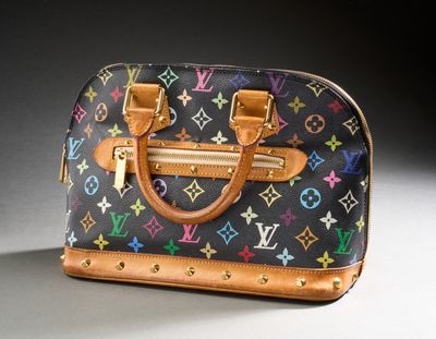 a louis vuitton handbag with multicolored stars on it