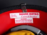 a close up of a helmet with a tag attached to it