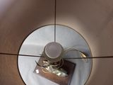 a light that is on in the middle of a lamp