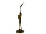a bronze statue of a giraffe standing on top of a base