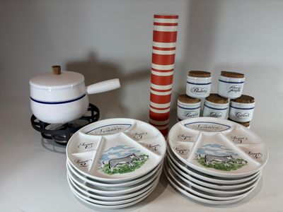 many plates that are sitting on a table
