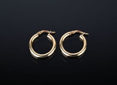 Paire de petites créoles or jaune 750/1000ème (leger enfonce…