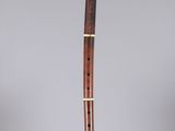 a flute that is sitting on top of a glass