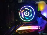 a close up of a computer case with a colorful light on it