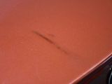 a brown table with a bmw emblem on it