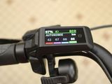 a close up view of a bike ' s handlebar with a display