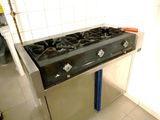 an image of a kitchen with a stove and a sink