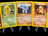 four different pokemon cards are shown in a row on a black background