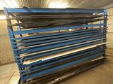 a close up of a stack of metal shelves in a warehouse
