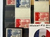 a picture of a collection of stamps in a display case