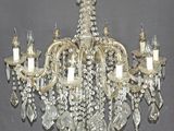 an image of a crystal chandelier hanging from a ceiling