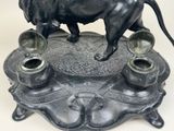 a statue of a lion on top of a table