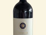 a bottle of wine that is sitting on a table