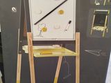 a cardboard easer that has a drawing board on it