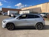 mercedes gla suv with 20 inch wheels in a parking lot