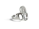 a silver ring with two circles and a diamond on it