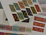 a lot of different patterns and colors on a table