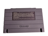 a nintendo game console sitting on top of a white table