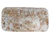 an image of a piece of stone with a man and a woman on it