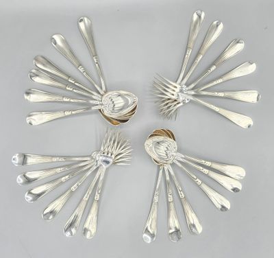 six forks and spoons arranged in a circle on a white surface