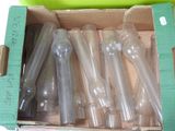 a box full of empty plastic bottles in a green box