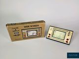 a box with a game on it next to a game screen
