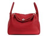 a red handbag on a white background