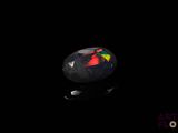 un oplite noir avec un centre rouge et vert sur fond noir