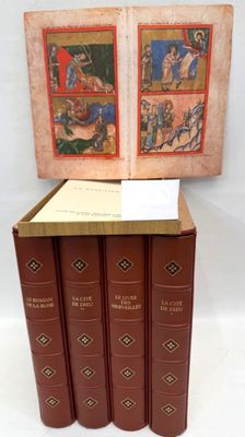 three books are stacked on top of each other on a white surface