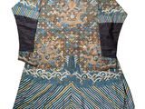a blue and brown dress with a floral design on it