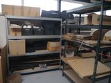 a room with a lot of boxes and boxes on the shelves