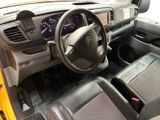 a picture of a car dashboard with a steering wheel