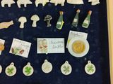 a shadow box with a bunch of small figurines in it