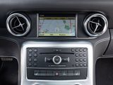 the dashboard of a car with a gps device in the center of it