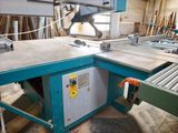 an image of a machine that is working on a piece of wood