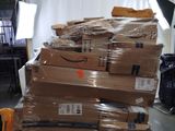 many boxes stacked on top of each other in a room
