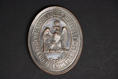 an image of a medal on a black surface